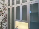 Spacious wardrobe with floral wallpaper