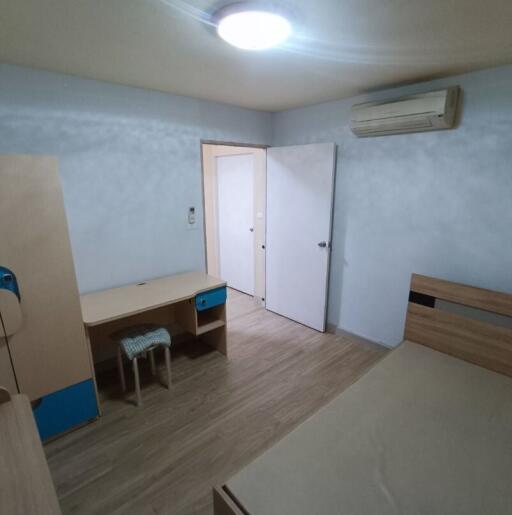 Bedroom with furniture and air conditioning