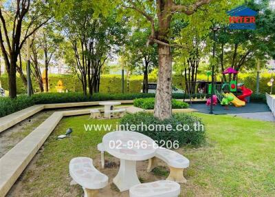 Outdoor area with playground and seating