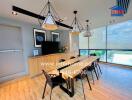 Modern dining room with large windows and stylish pendant lights