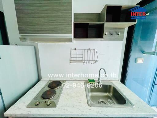 Modern kitchen with stove and sink