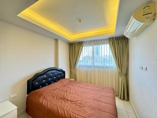 Cozy bedroom with bed and window