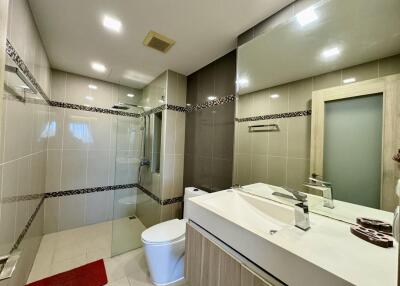 Modern bathroom with shower and vanity