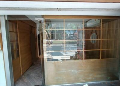 Property entrance with large glass window