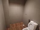 Small bathroom with a white toilet