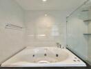 Spacious bathroom featuring a modern jacuzzi tub