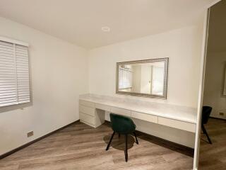 Bedroom with desk and chair