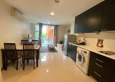 Modern kitchen and dining area with integrated living space