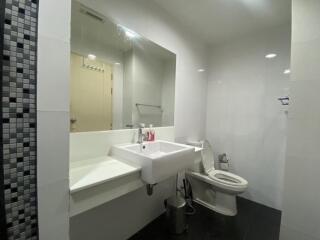 Modern bathroom with sink and toilet