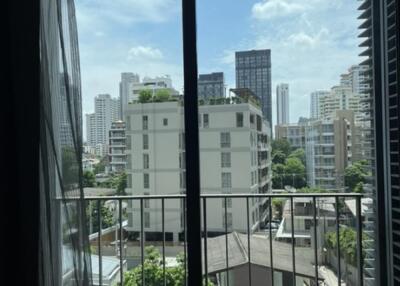 View from living room window with city skyline