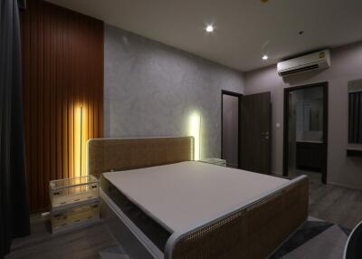 Modern bedroom with stylish design and lighting