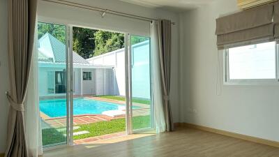 Living area with view of the pool