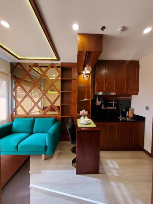 Modern living space with kitchen and seating area
