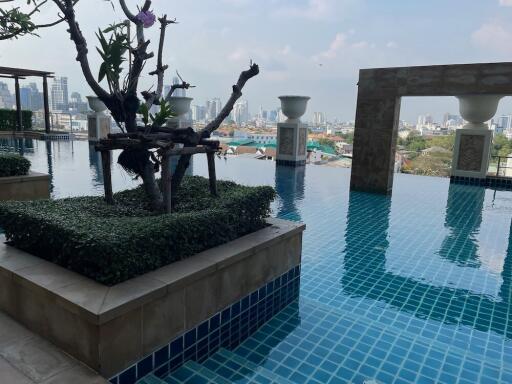 Rooftop infinity pool with city view