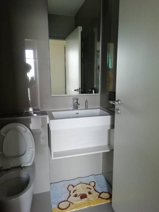 Modern bathroom with vanity and toilet