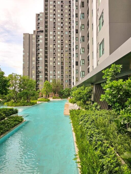 modern apartment building with swimming pool