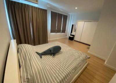 Modern bedroom with a large bed and stylish decor
