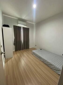 Minimalist bedroom with mattress and wardrobe
