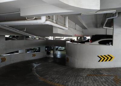 multi-story parking garage with cars