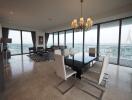 Spacious living and dining area with city views