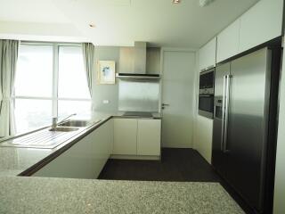 Modern kitchen with stainless steel appliances