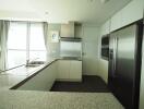 Modern kitchen with stainless steel appliances