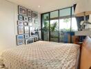 Modern bedroom with gallery wall and private balcony