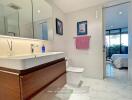 Modern bathroom with view into the bedroom