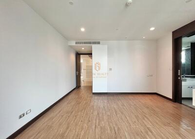 Spacious living room with wooden flooring