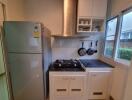 Compact kitchen with appliances