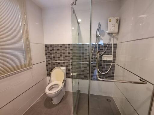 Modern bathroom with shower and toilet