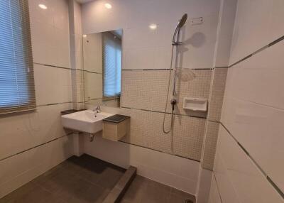 Modern bathroom with sink and shower