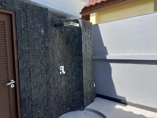 Outdoor Shower Area with Privacy Wall