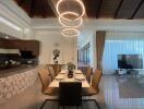 Modern dining area with stylish chandelier