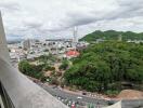 View from the balcony overlooking the city and greenery