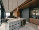 Modern kitchen with marble island and built-in appliances