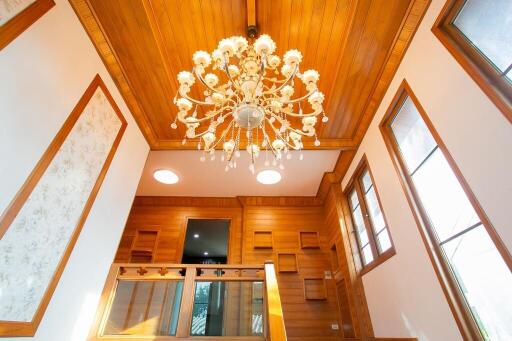 Stylish wooden interior with chandelier