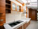 Spacious kitchen with wooden cabinets and modern fixtures