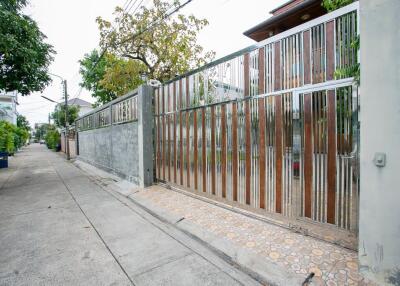 Exterior view of a gated property entrance