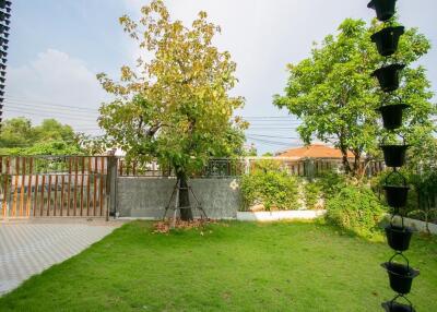 Backyard with fence and trees