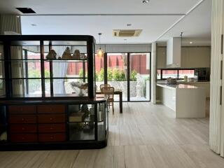 Modern living space with an open kitchen and dining area