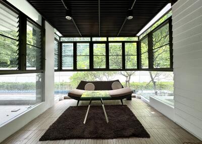 Spacious and modern sunroom with large windows