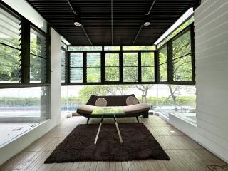 Spacious and modern sunroom with large windows