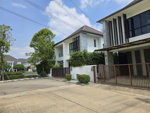 Modern residential building with gated entrance