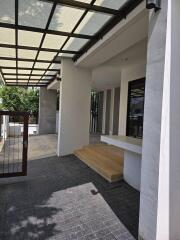 Front entrance of a building with a covered walkway