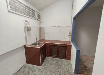 Simple kitchen with sink and cabinet