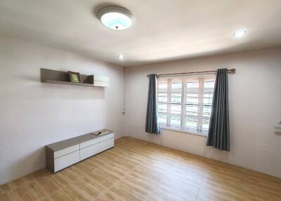 Minimalist living room with wooden flooring