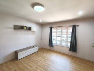 Minimalist living room with wooden flooring