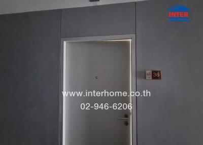 Apartment entrance door with room number 36