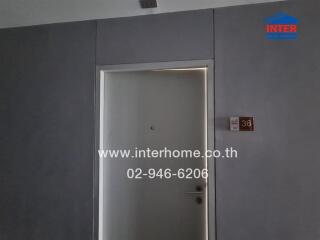 Apartment entrance door with room number 36
